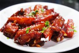 HONEY CHILLI POTATO WITH SESAME SEEDS BY THYME N CLOVES in New York,NY